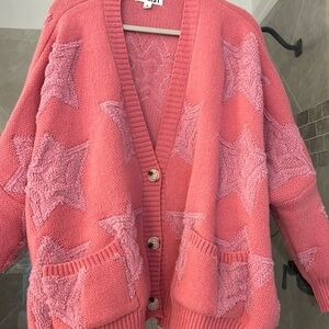 Oversized pink cardigan with light pink stars